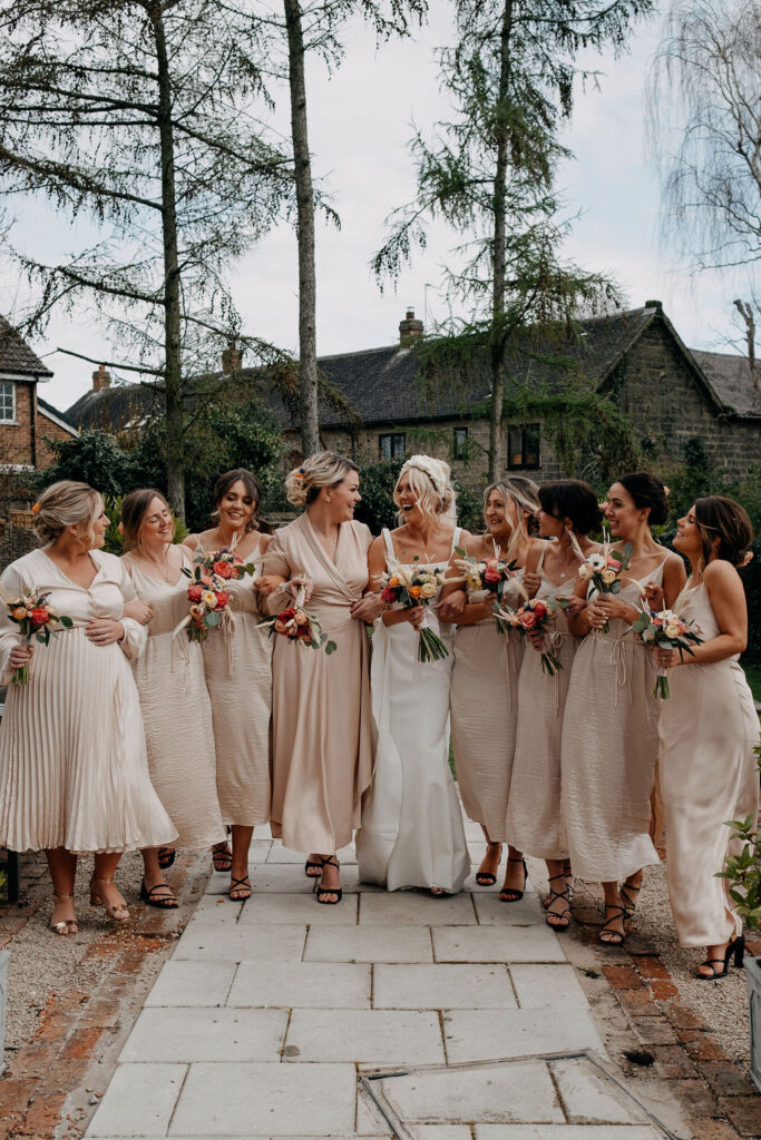 formal wedding photo of bridesmaids in the garden at an amalfi white wedding