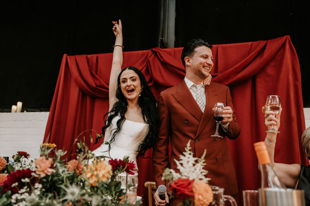 Relaxed wedding guests inside Sheffield warehouse venue